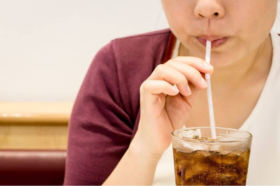 Fizzy drink with straw